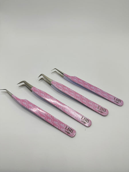 Dior pink tweezers